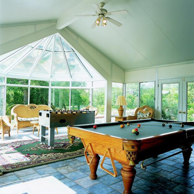A beautiful interior photo of a covered game area.